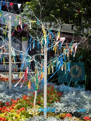 Colourful Looms And Ribbons On Artificial Trees In East Grinstea… Stock Photo
