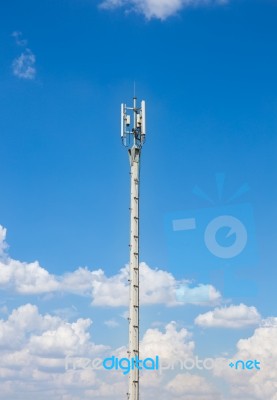 Communication Antenna Repeater Tower On Blue Sky Background Stock Photo