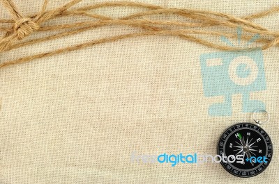 Compass And Rope Stock Photo