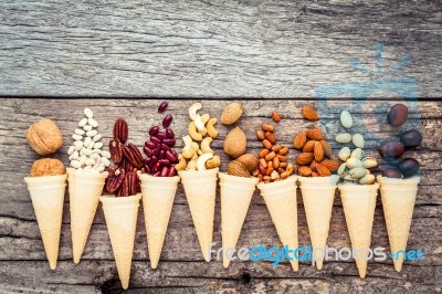 Concept For Homemade Various Nuts Ice Cream. Mixed Nuts In Waffl… Stock Photo