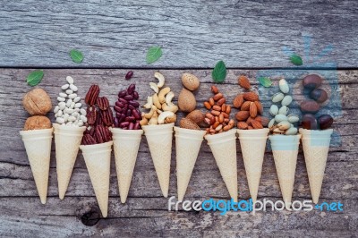 Concept For Homemade Various Nuts Ice Cream. Mixed Nuts In Waffl… Stock Photo