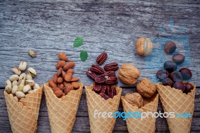 Concept For Homemade Various Nuts Ice Cream. Mixed Nuts In Waffl… Stock Photo