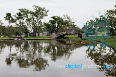 Concrete Bridge And Lagoon In Public Park Stock Photo