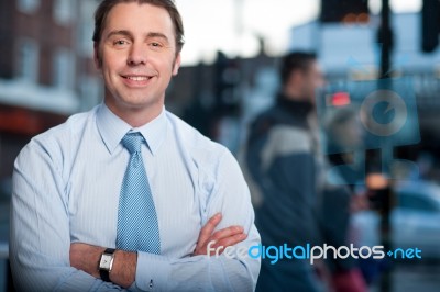 Confident Businessman Posing, Street Background Stock Photo