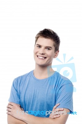 Confident Casual Man With Folded Arms Stock Photo