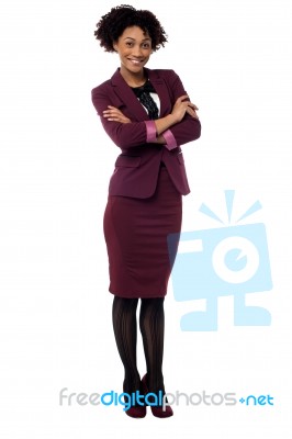 Confident Corporate Woman With Folded Arms Stock Photo
