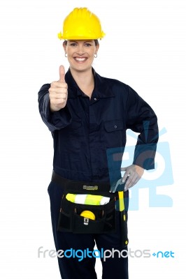 Confident Lady Worker Showing Thumbs Up Stock Photo