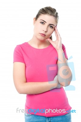 Confused Pretty Teenager Thinking Hard Stock Photo