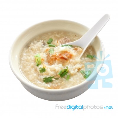 Congee Round Bowl And Spoon On White Background Stock Photo