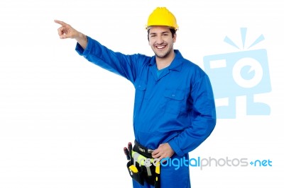 Construction Worker Pointing Away Stock Photo