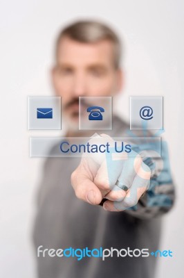 Contact Us Button On Virtual Screen Stock Photo