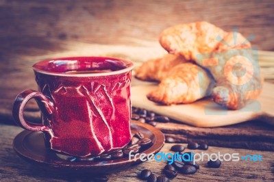 Continental Breakfast With Coffee And Croissant Stock Photo