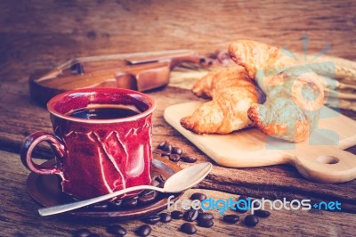 Continental Breakfast With Coffee And Croissant Stock Photo