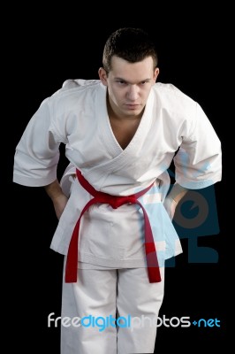 Contrast Karate Young Fighter On Black Stock Photo