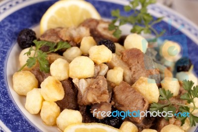 Cooked Meat With Potatoes Stock Photo