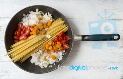 Cooking Spaghetti With Vegetables And Herbs Stock Photo
