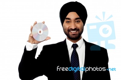 Cool Manager Showing Compact Disc Stock Photo