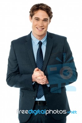 Corporate Guy Posing With Clasped Hands Stock Photo