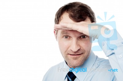 Corporate Guy Watching Something Closely Stock Photo