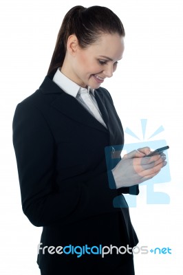 Corporate Lady Reading Sms Stock Photo