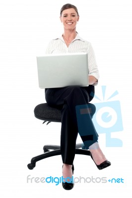 Corporate Lady Working On Her Laptop Stock Photo
