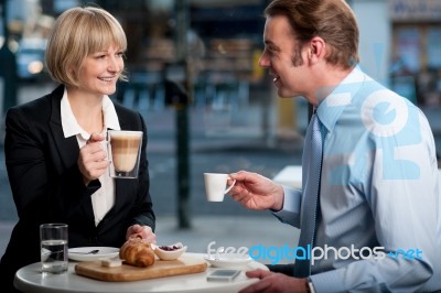 Corporate People Toasting Coffee At Cafe Stock Photo