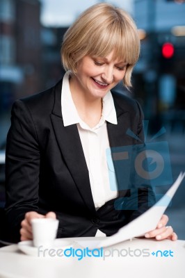 Corporate Women In Cafe With Reports Stock Photo