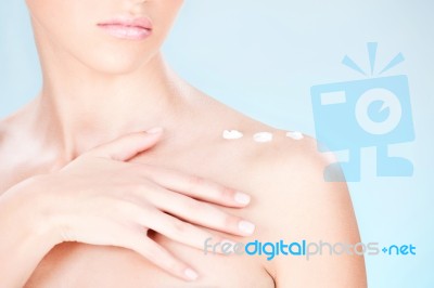 Cosmetic Cream On Woman's Shoulder Stock Photo