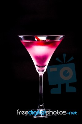 Cosmopolitan Cocktail With Rose In Top Of A Black Background Stock Photo