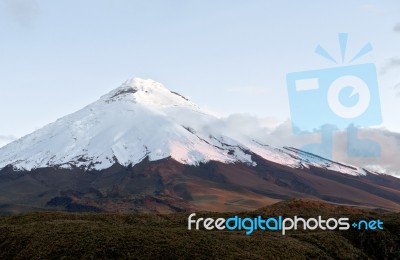 Cotopaxi Volcano Over The Plateau On The Sunset. Andean Highland… Stock Photo