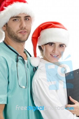 Couple Doctors Wearing Santa Hat Stock Photo