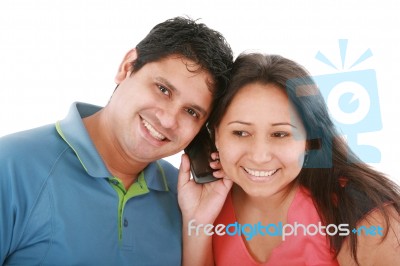 Couple Listening On Cell Phone Stock Photo