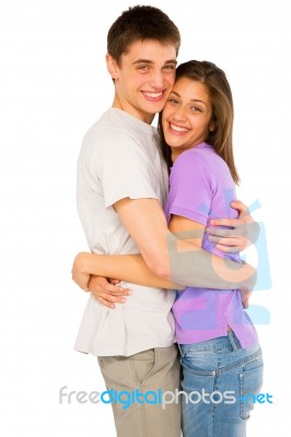 Couple Of Teenagers Embracing Stock Photo