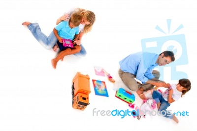 Couple Playing With Children Stock Photo