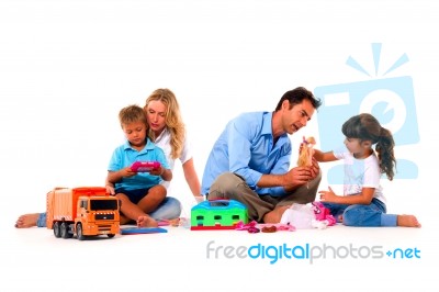 Couple Playing With Children Stock Photo