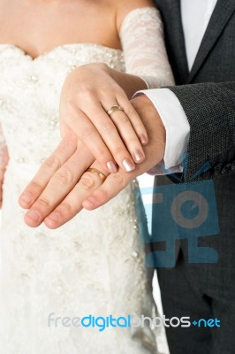 Couple Showing Their Wedding Bands Stock Photo