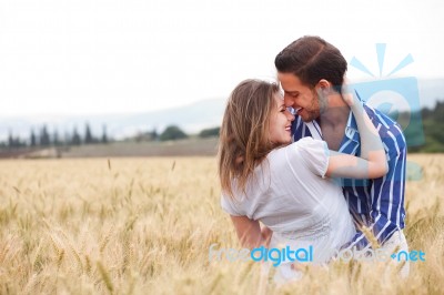 Couple Smiling Eachother Stock Photo