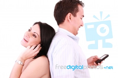 Couple Talk On Mobile Stock Photo