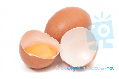 Cracked Egg With Yolk Stock Photo
