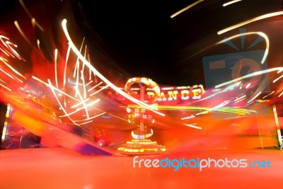 Crazy Dance With Neon Light Stock Photo