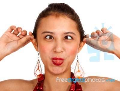 Crazy Girl Cross Eyed And Pulling Her Ears Stock Photo