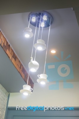 Created Tea Ceramic Set Hanging Light Lamp Stock Photo