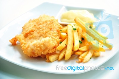 Crispy Fish With French Fries Stock Photo