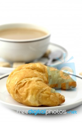 Croissant And Coffee Stock Photo