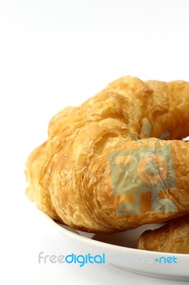 Croissant On White Background Stock Photo