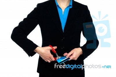 Cropped Imaege Of Lady Cutting Her Cash Card Stock Photo