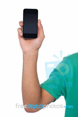 Cropped Image Of A Guy Displaying Mobile Handset Stock Photo