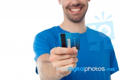 Cropped Image Of A Man Displaying His Cash Card Stock Photo