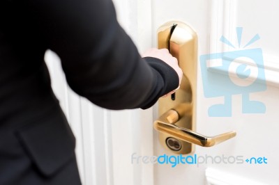 Cropped Image Of Female Hand Opening Door Stock Photo