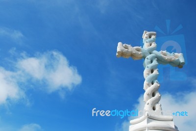 Cross In Clouds And Blue Sky Stock Photo